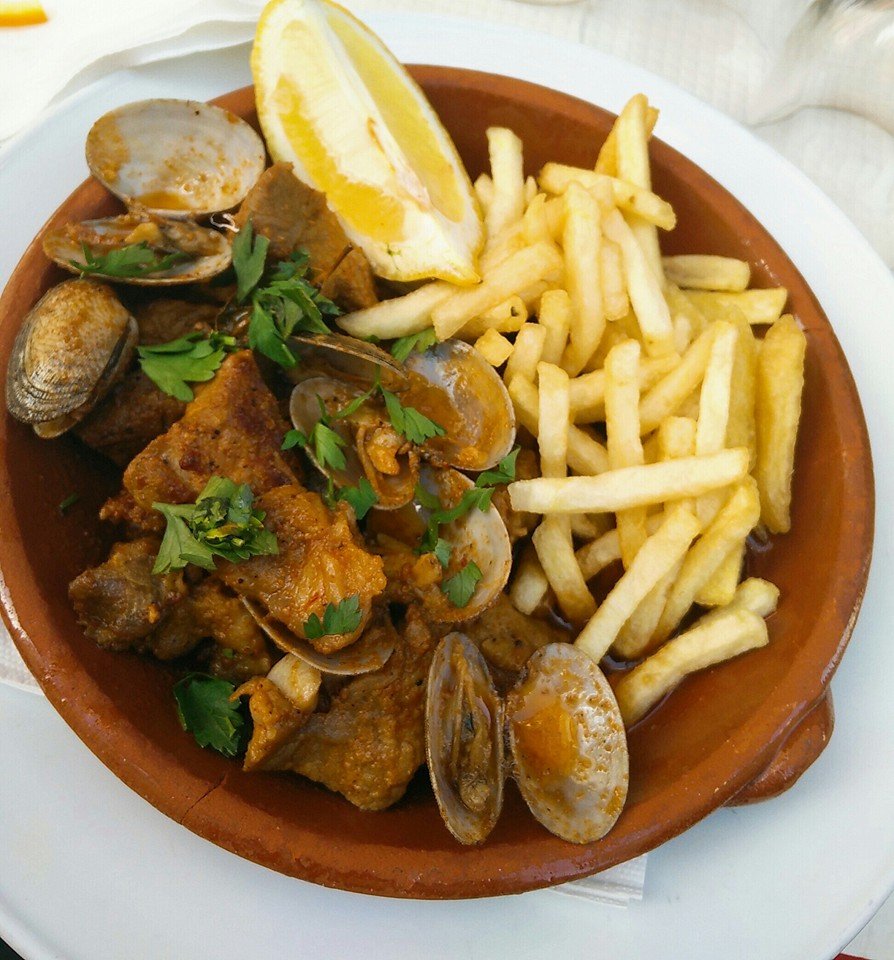 Carne de Porco is pork with clams Alentejo style. The sublime combination works making it a meal highlight.
